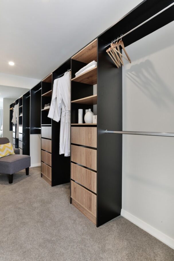 closet with coathangers in new build home at paerata rise